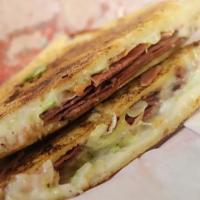 Pastrami and Queso Sandwich · Turkey, ham, and salami sandwich.