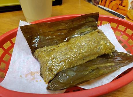 Pasteles de guineo · Pasteles en hoja is a plantain and root vegetables masa (dough) filled with meat and made into a pocket using plantain leaves.