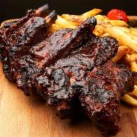 BBQ Ribs · 3 pieces. Spare rubs with Asian BBQ sauce.