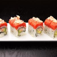 Red Dragon Roll · Kani, avocado and cucumber inside and spicy tuna with crunch on top. 