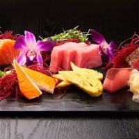 Sashimi Regular Combo · Three pieces of salmon, three pieces of tuna, two pieces of black pepper tuna, one piece of ...