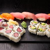 Sushi Deluxe Combo · Two pieces of salmon sushi, two pieces of tuna sushi, one piece of kani, one tuna roll, one ...