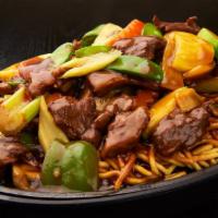 Sizzling Noodles with Beef · Pan-fried crispy noodles topped with beef and assorted vegetables.