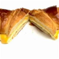 2 Eggs and Cheese on Croissant · A flaky French pastry.