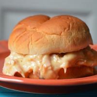 Ovengold Turkey Breast Sandwich · Sliced onions, lettuce, tomato, and melted smoked gouda cheese.