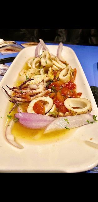 Grilled Calamari · tender calamari, char-grilled and marinated in our
special sauce