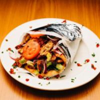 Chicken Gyro Sandwich · marinated chicken, roasted and sliced, served on toasted pita with lettuce, tomatoes, onions...