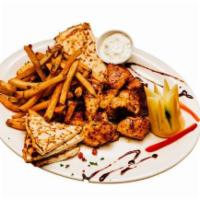 Chicken Souvlaki Platter · cubed marinated chicken grilled until juicy and
tender