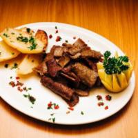 Lamb Gyro Platter · marinated hand-stacked meat, slow roasted and sliced off a vertical rotisserie