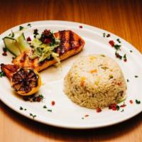 Grilled Salmon · Served with Pita + choice of Rice, Fries, Lemon Potatoes, or Broccoli.