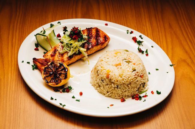 Grilled Salmon · Served with Pita + choice of Rice, Fries, Lemon Potatoes, or Broccoli.