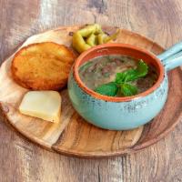 Lobio with Mint · Red kidney beans cooked with traditional spices and mint, served with assorted pickles and c...