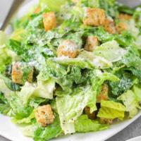 Caesar Salad · Crispy romaine lettuce & croutons tossed in creamy Caesar dressing; Topped with grated chees...