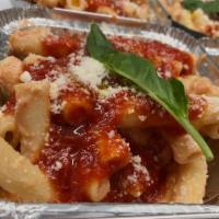 Baked Ziti · Oven baked Ziti tossed with ricotta, mozzarella, tomato sauce; Topped with extra virgin oliv...