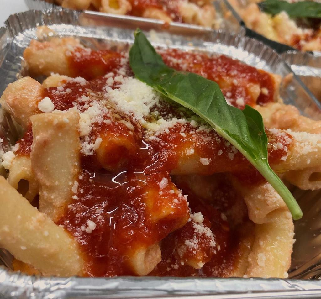 Baked Ziti · Oven baked Ziti tossed with ricotta, mozzarella, tomato sauce; Topped with extra virgin olive oil, fresh basil, and Parmesan cheese;