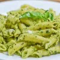 Pesto Penne · Tossed in thick, homemade, fresh basil pesto sauce, topped with grated cheese and fresh basil.