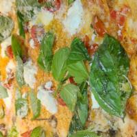 La Burrata Pizza · Sauce, mozzarella, cherry tomatoes, topped with fresh burrata, basil, Parmesan and EVOO.