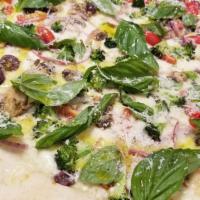 Giardiniera Pizza · No Sauce. Mozzarella, cherry tomatoes, mushrooms, broccoli, olives and onions, topped with f...