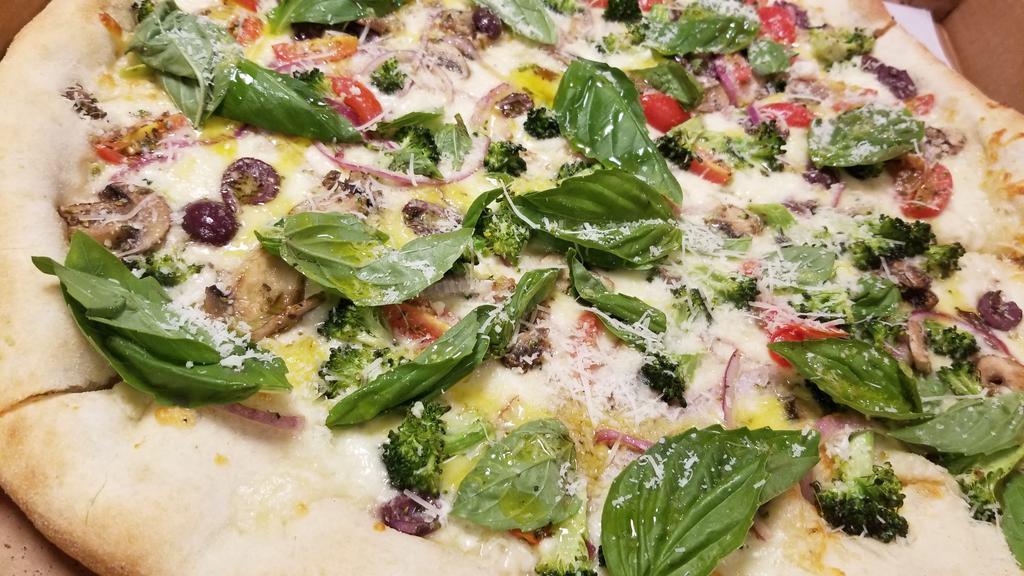Giardiniera Pizza · No Sauce. Mozzarella, cherry tomatoes, mushrooms, broccoli, olives and onions, topped with fresh basil and extra virgin olive oil.