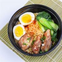 N2 旦旦面（辣）Dan Dan Noodle · w/roast pork, shanghai greens,egg,scallion, in spicy pork bone soup
