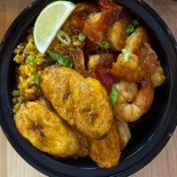 The Cabo Rojo · Sauteed shrimp over arroz con gandules and maduros