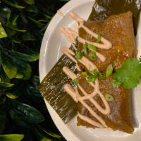 Pasteles · A traditional Puerto Rican treat filled with our signature pernil, olives, and a mix of spic...