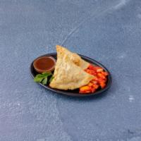 Samosa · Crisp and lightly spiced turnovers, stuffed with minced meat or vegetable.