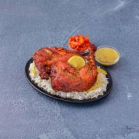 Chicken Tandoori Ala Carte · Chicken marinated in herbs and spices, oven roasted. Served with pillaw rice, dhal and onion...