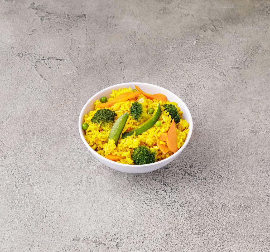 Pineapple Fried Rice · Served with pineapple, onion, carrot, pea and egg.