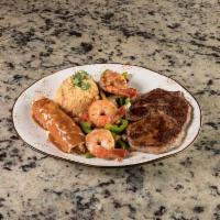Casa Tequila Steak · Rib eye steak, grill shrimp with tomatoes, bell peppers and onions. Served with rice and 1 c...