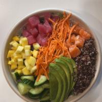 Rainbow Bowl · Ahi tuna, salmon, avocado, cucumber, carrot, mango, creamy sauce, quinoa, crushed cashew nut...