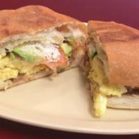TORTAS · Your choice of meat, fried beans, lettuce, tomato, avocado and jalapeños.