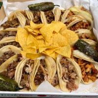 12 Street Tacos · Includes: 12 street tacos, your'e choice of meat, cilantro, onion , 2 grilled jalapenos and ...