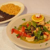 Fajitas De Camarones · Shrimp fajita. Served with rice, beans & tortillas. Servido con arroz, frijoles y tortillas. 