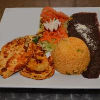 Pechuga a La Parrilla · Grilled chicken breast. Served with rice, beans and tortillas.