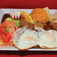 Bistec a Caballo · Skirt steak and fried eggs. Served with rice, beans and tortillas. 