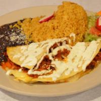 Hongos Con Rajas Quesadilla · Mushrooms and peppers. Served with rice, beans and salad.