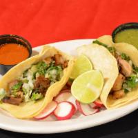 Tacos Mexicanos · Order comes with two tacos with the same meat. With cilantro and onions.