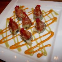 Spicy Tuna Tower · Crispy rice cake topped with spicy tuna and honey wasabi sauce. 