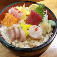 Chirashi · 12 pcs assorted raw fish over rice.