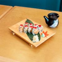 Spicy Girl Roll · 8 pieces. Spicy tuna, salmon, yellowtail, avocado and crunchy topped with tobiko.