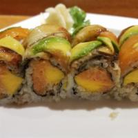 Venus Roll · 8 pieces. Spicy salmon, crunchy, mango, topped with salmon, eel and avocado.