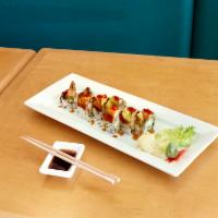 Dragonfly Roll · 8 pieces. Shrimp tempura, kampyo and cucumber topped with eel, avocado and tobiko.