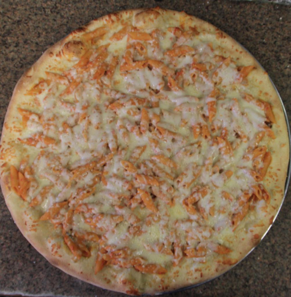 Penne alla Vodka Sauce Pizza · Penne pasta in our homemade vodka sauce and freshly grated mozzarella cheese.