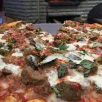 Meat Lovers Pizza · Homemade pizza sauce & freshly grated mozzarella cheese topped with, meatballs, ground sweet...