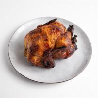 Whole Rotisserie Chicken · Our signature rotisserie chicken! Feeds two to four people. 
