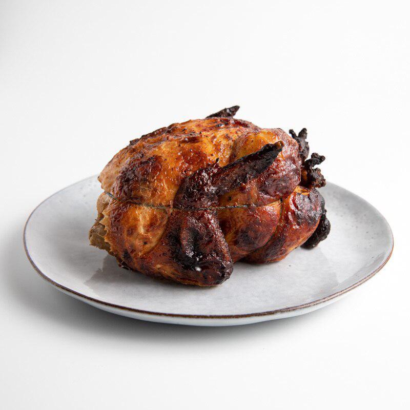 Half Rotisserie Chicken · One half of our signature rotisserie chicken. Feeds one to two people. 
