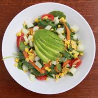 Avocado Kale Salad  · Cherry tomatoes, corn, shaved carrots, hass avocado, cucumber and tamarind dressing.
