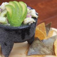 Aguachiles Mazatlan  · Red or green, shrimp, octopus, cucumber, red onions, avocado, cilantro and lime broth.