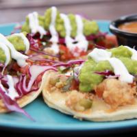 Tacos Ensenada  · 3 pieces. Beer-battered shrimp or fish, pico de gallo, mayo, red cabbage, guacamole sauce an...